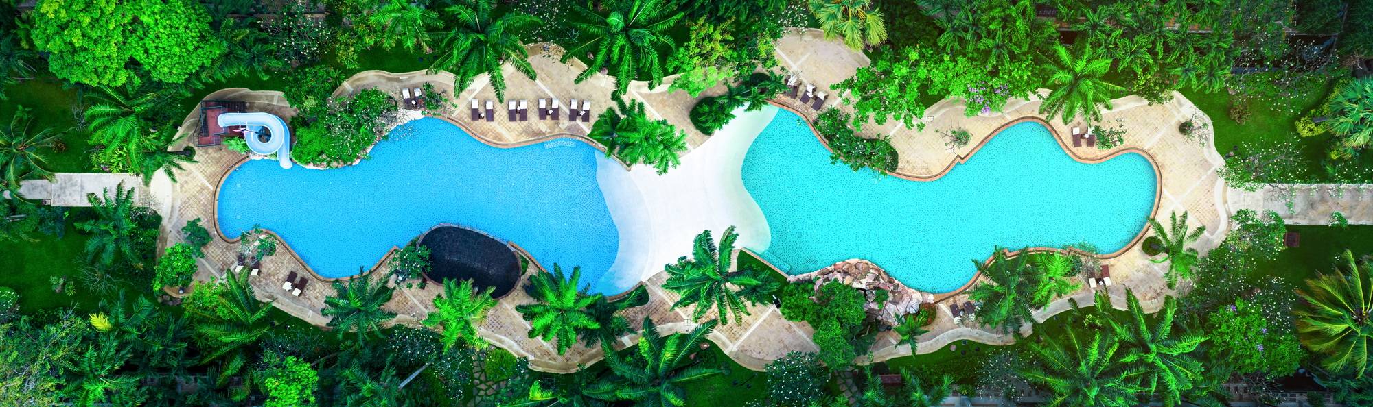 clean water luxury curve of Swimming Pool in the condominium or villa resort , hotal, Garden Palm